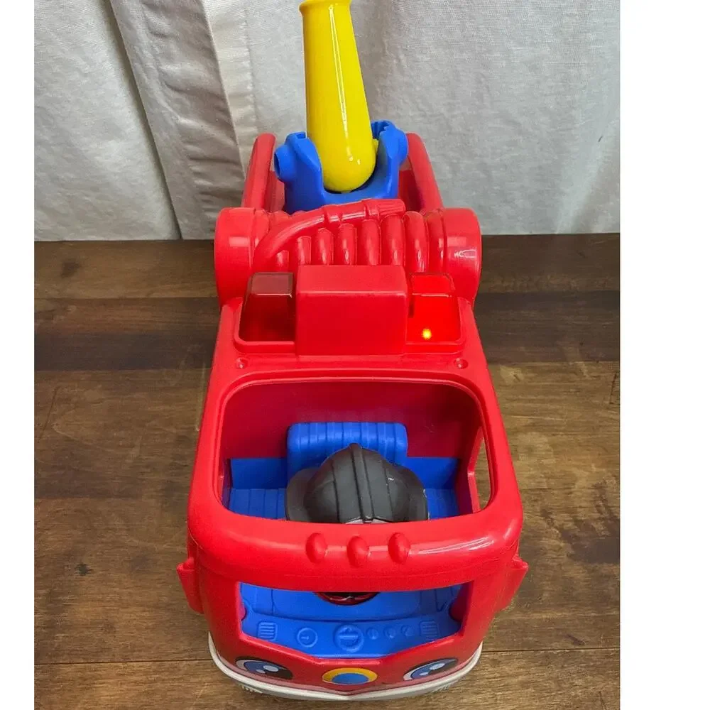 Fisher-Price Little People Helping Others Fire Truck & Figures 2016 Musical Toy